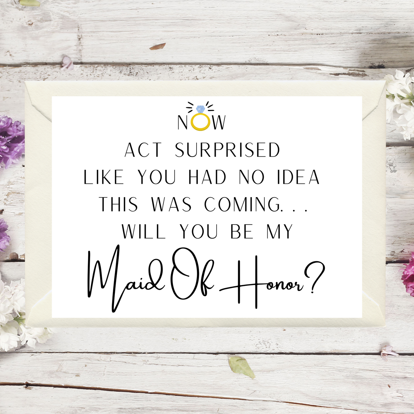 Proposal card for maid of honor with floral decorations on a wooden background