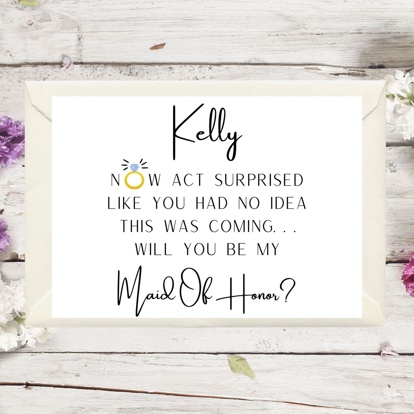 Proposal card for Maid of Honor with floral decorations on a wooden background