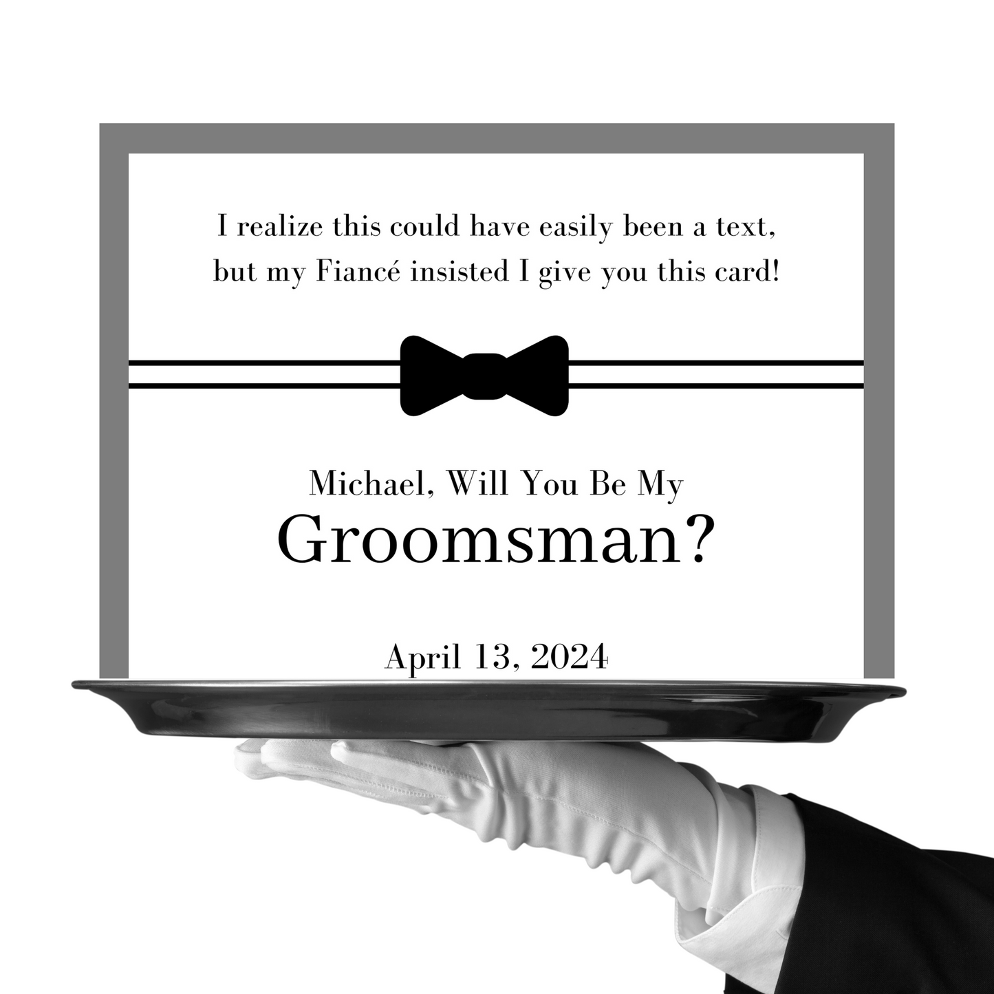 Groomsman proposal card held by a gloved hand with a bow tie graphic and text.