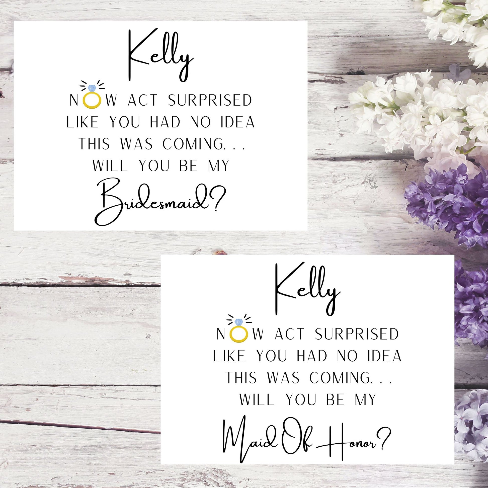 Two cards with personalized requests for bridesmaid and maid of honor on a wooden surface with flowers.