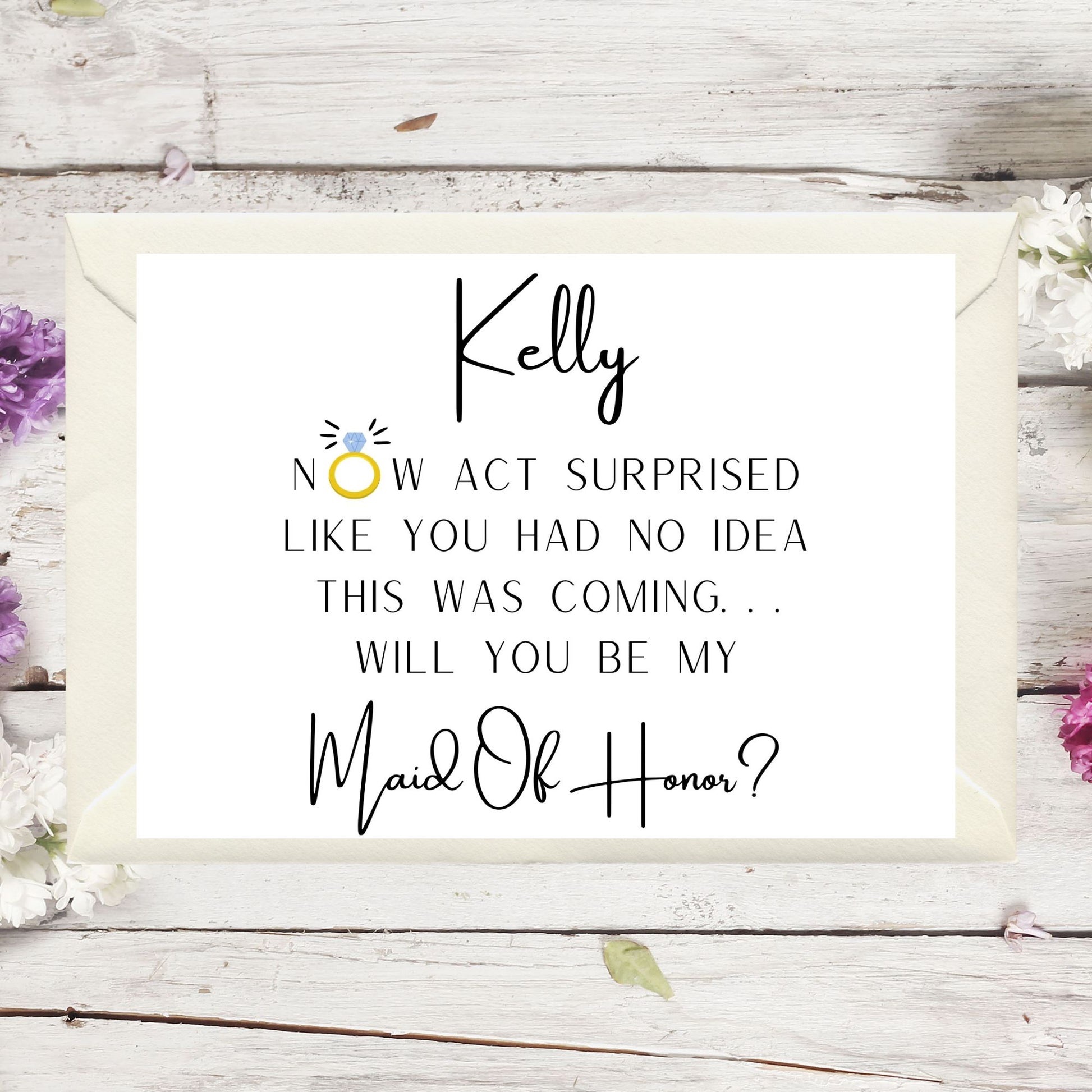 Proposal card for Maid of Honor with floral decorations on a wooden background